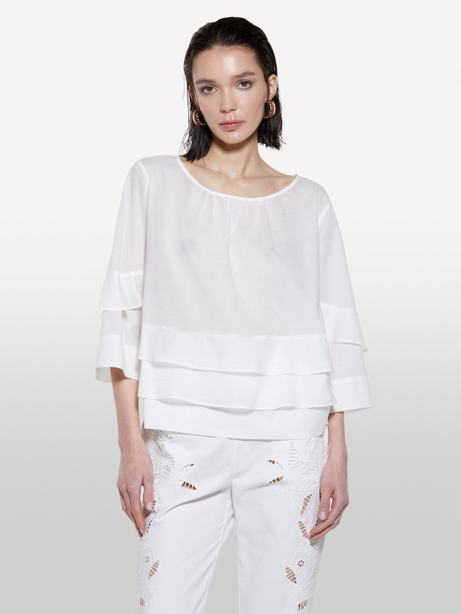 White blouse with frills