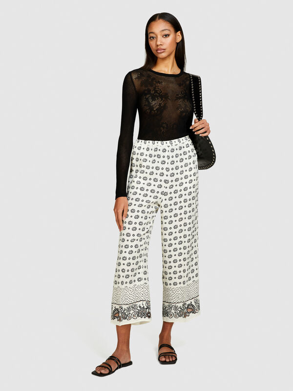 Pantaloni stampati in satin - pantaloni flare da donna | Sisley