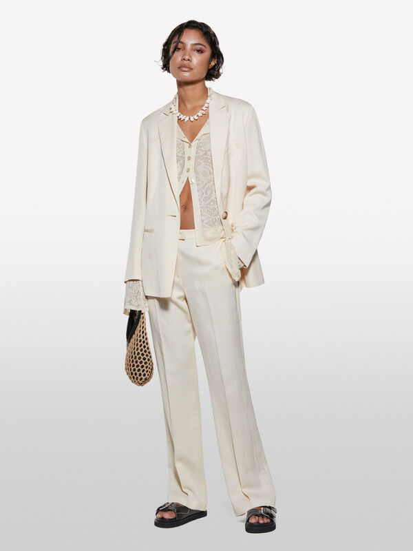 Pantaloni sabbia con spacchi - pantaloni palazzo da donna | Sisley