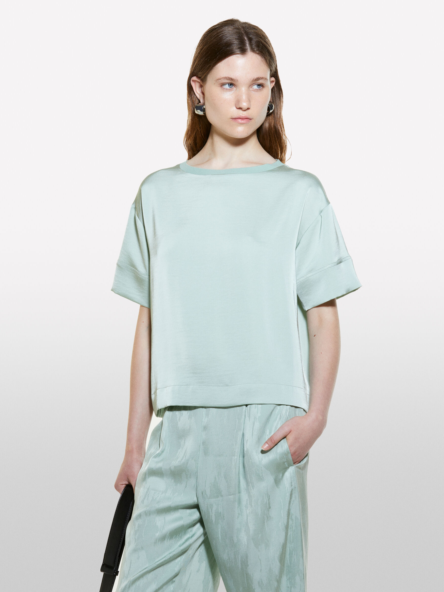 Blusa verde chiaro a maniche corte Verde Chiaro Sisley