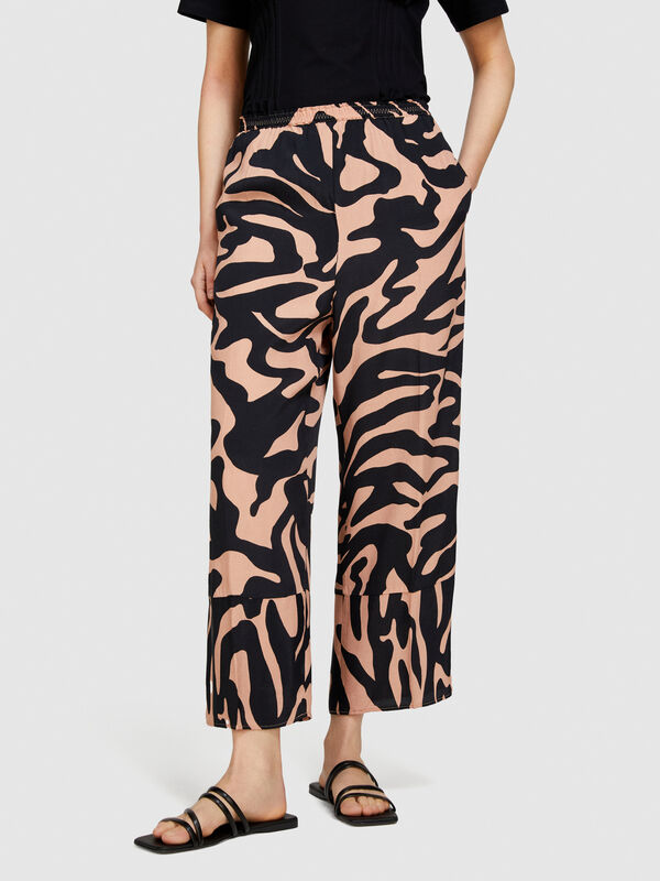 Pantaloni stampati in satin - pantaloni flare da donna | Sisley