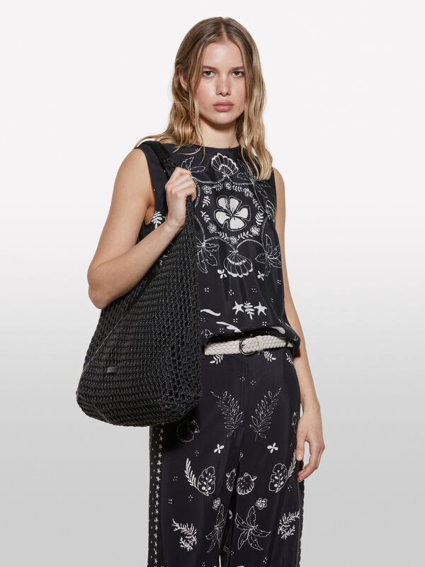 Top nero stampato con scollo dietro - top da donna | Sisley