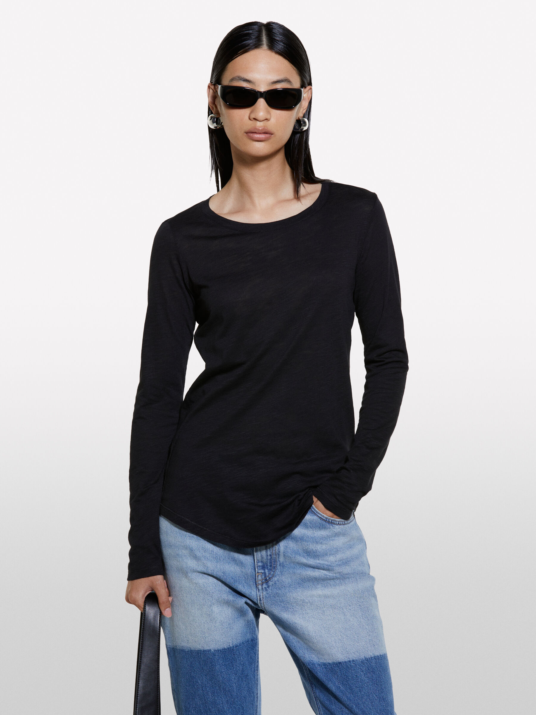 Magliette nere lunghe new arrivals