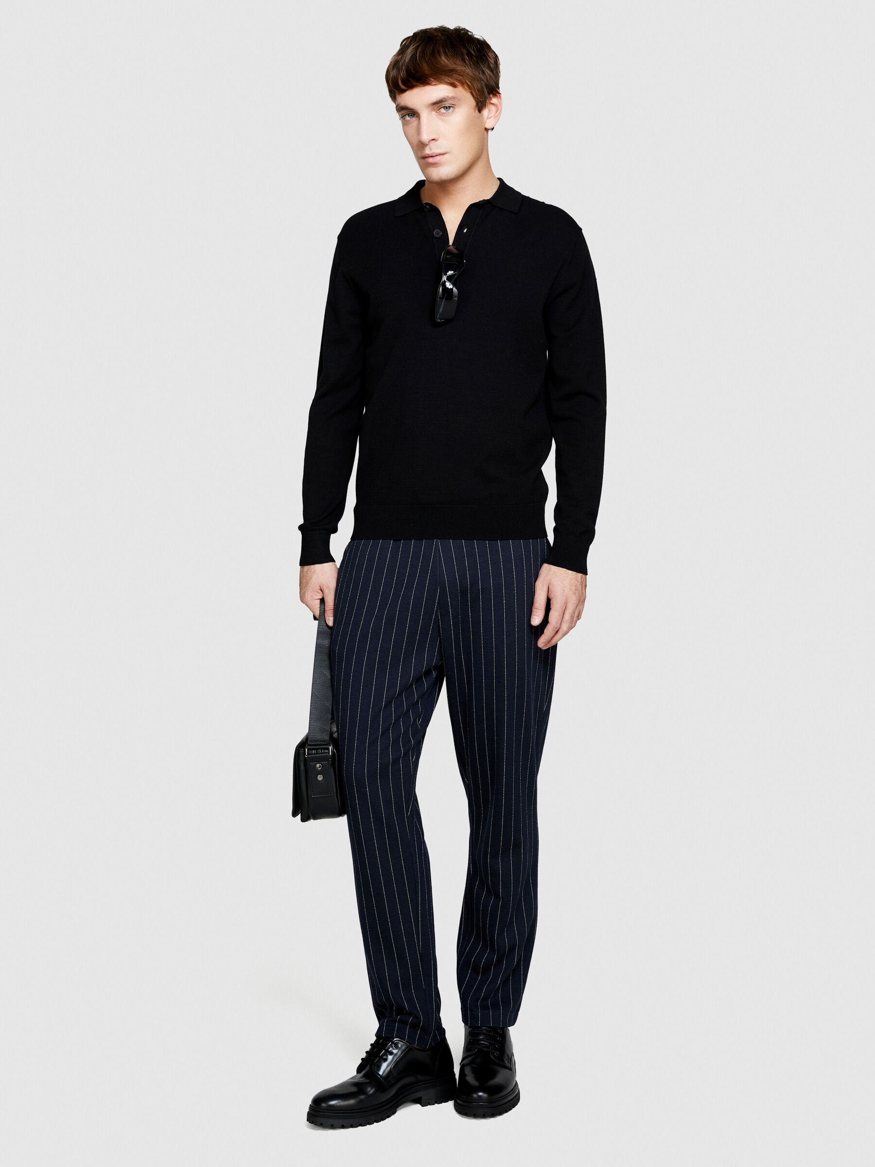 Polo in maglia Nero Uomo Sisley
