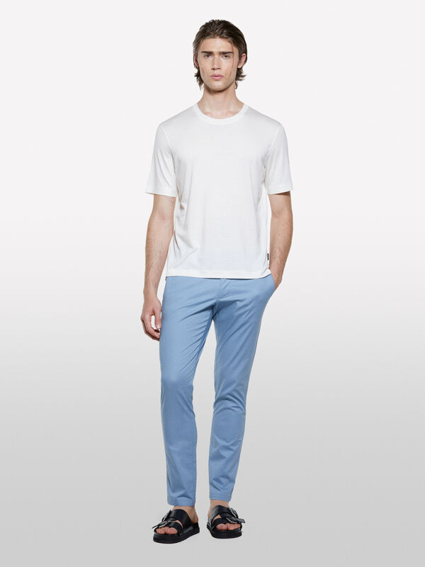 Pantaloni chino azzurri slim fit Pantaloni chino azzurri slim fit - pantaloni slim da uomo | Sisley