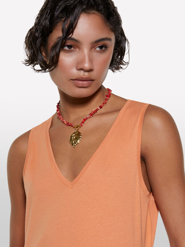 Canotta arancione con scollo a V - top da donna | Sisley