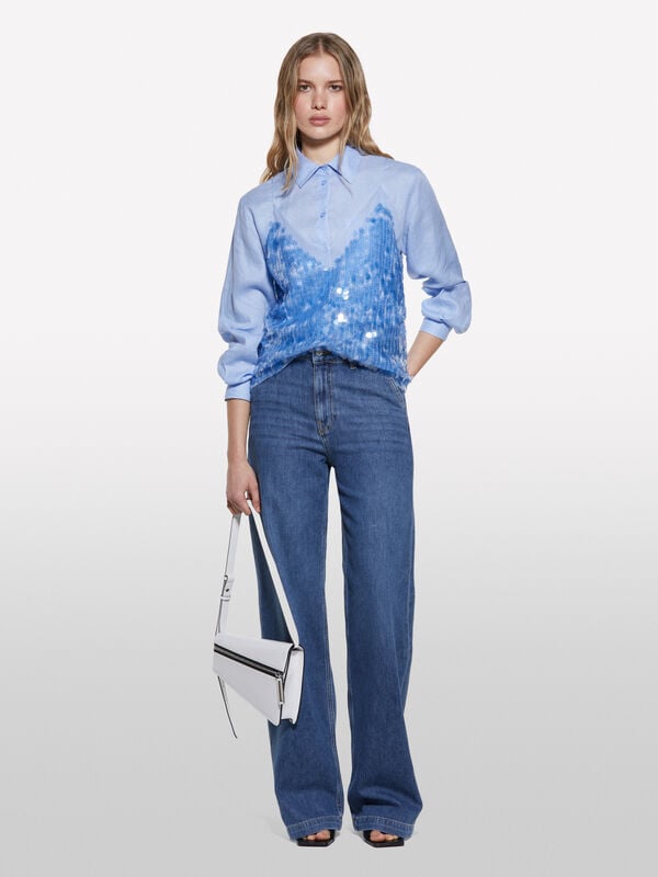 Top azzurro con paillettes Top azzurro con paillettes - top da donna | Sisley