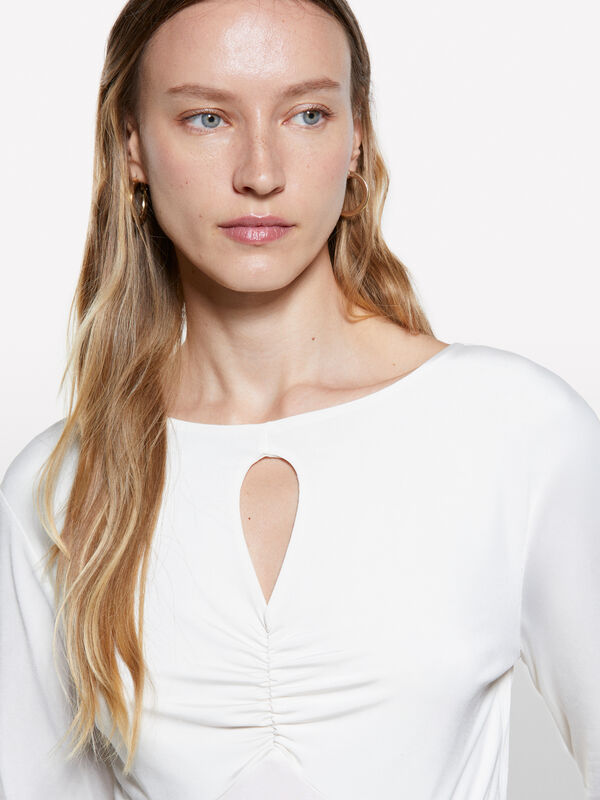 Maglietta bianco panna con arriccio  - t-shirt a manica lunga da donna | Sisley