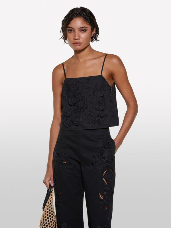 Top cropped nero con fiori - top da donna | Sisley