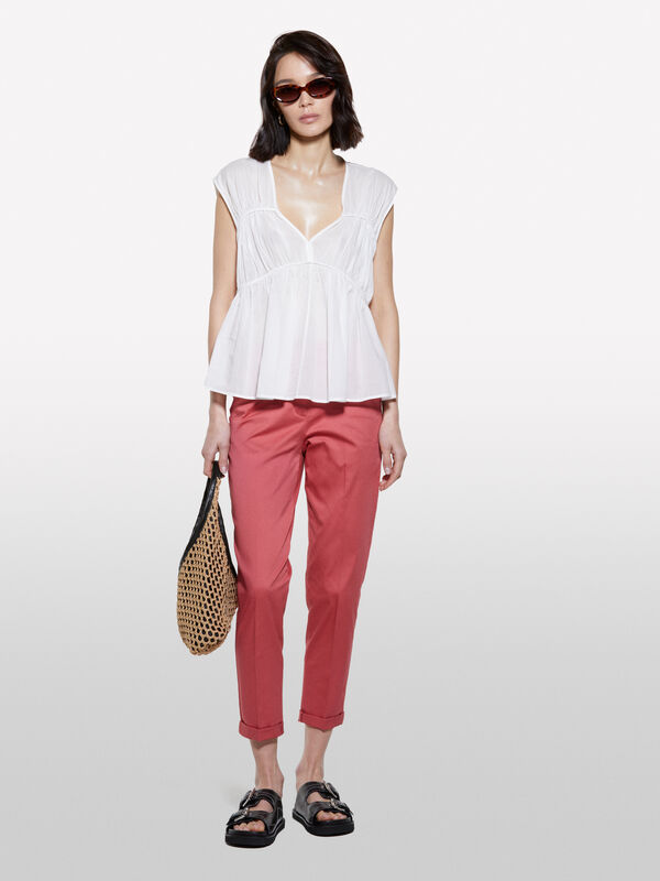 Top bianco con arriccio Top bianco con arriccio - top da donna | Sisley